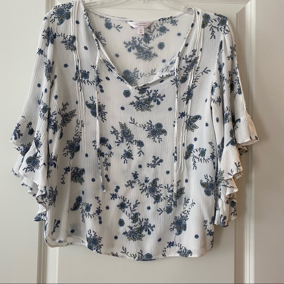 LC Lauren Conrad Tops - Lauren Conrad asymmetrical sleeve floral blouse